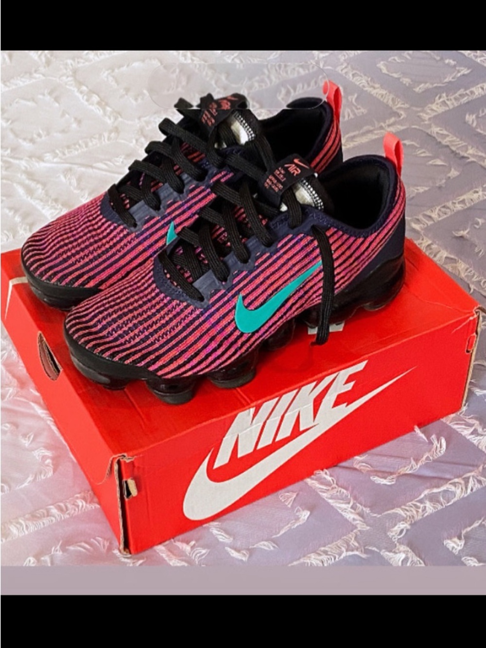 Nike Flyknit Sneakers in Pink and Black with Teal Swoosh